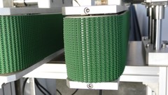 Hugger Belt Conveyor, Side Grip for Bottomless Transfer Conveyor & Bottom Coding