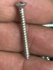 1 1/4 sheet metal screw Straight flat head. 2 Pounds 6 Ounces Of Screws