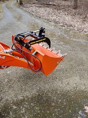 Thumb Grapple. Universal add on grapple attachment for tractors and skid steers