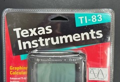 TI-83 Graphing Calculator. New in Box with Fresh Batteries.