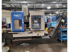1997 Hitachi Seiki VM40iii 22″ X, 18″ Y, 12000 RPM, 20 ATC, Seicos A10M