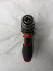 PRE OWNED MILWAUKEE TOOLS 3404-20 HAMMER DRILL/ DRIVER WITH BATTERY (P23017103)