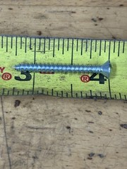 1 1/4 sheet metal screw Straight flat head. 2 Pounds 6 Ounces Of Screws