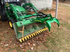 Thumb Grapple. Universal add on grapple attachment for tractors and skid steers