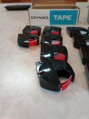 1956 DYMO EMBOSSING TAPE Qty 27 Red Green Gold Yellow Blue Orange Brown Black