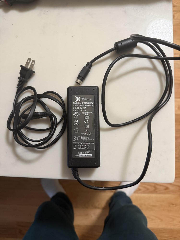 Ximeta Technology UEA325D-0512 Power Supply AC Adapter 4-pin AC100-240V 50/60