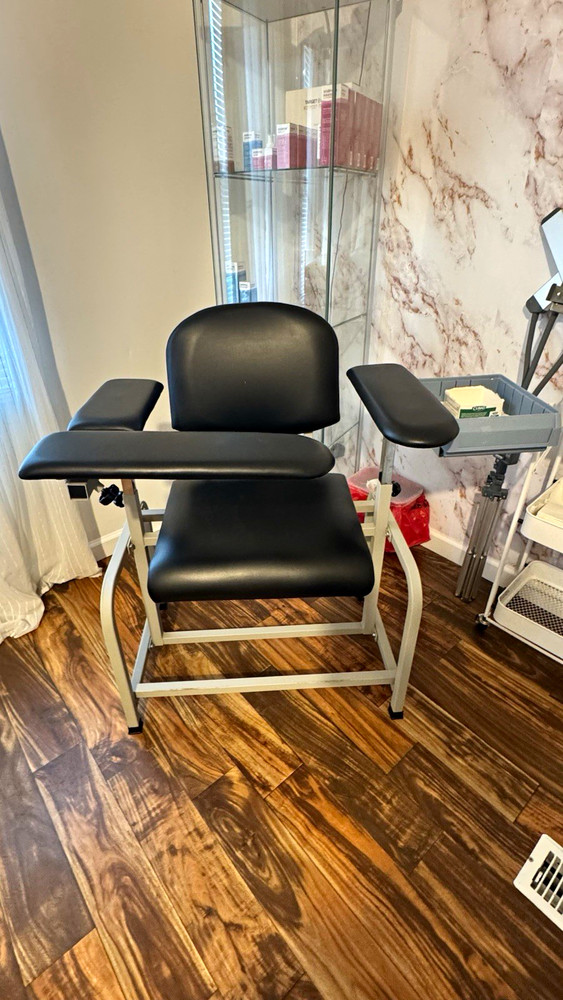 Midmark Black Upholstered Exam Table with Armrests, Family Medicine