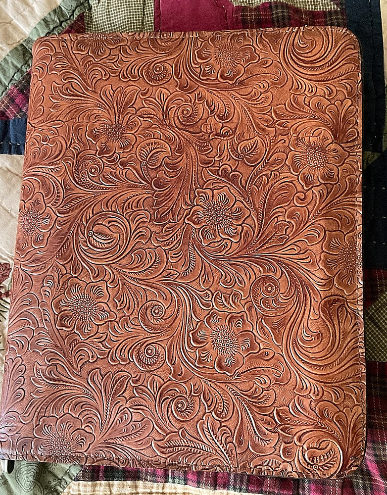 CHESTNUT WESTERN FLORAL EMBOSSED COWHIDE LEATHER NOTEBOOK ON A CASE LOGIC BASE