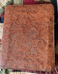 CHESTNUT WESTERN FLORAL EMBOSSED COWHIDE LEATHER NOTEBOOK ON A CASE LOGIC BASE