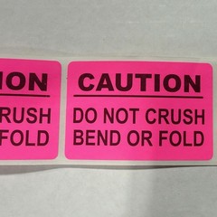 Neon Pink CAUTION Labels 2” x 3” – 250 Labels Per Roll