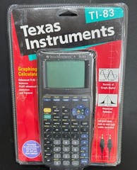 TI-83 Graphing Calculator. New in Box with Fresh Batteries.