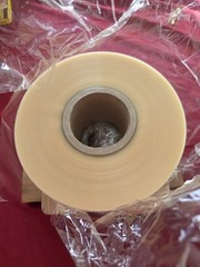 roll of BOPP (Biaxially Oriented Polypropylene) film.135mm in width, 1000m in…