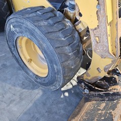 CAT 236D3 Right/Passenger Tire and Rim – Used