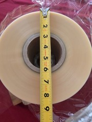 roll of BOPP (Biaxially Oriented Polypropylene) film.135mm in width, 1000m in…