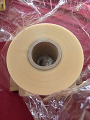 roll of BOPP (Biaxially Oriented Polypropylene) film.135mm in width, 1000m in…