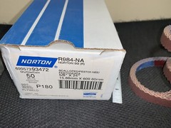 100 each sanding belts new NORTON USA 180 grit scallop edge 24″ x 5/8″ P180