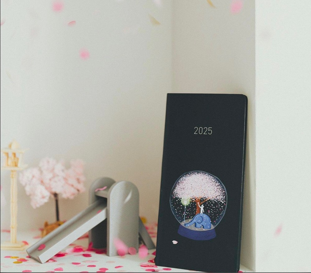 2025 Hobonichi Techo Weeks – Hiroko Kubota: Night Cherry Blossom Snow Globe.