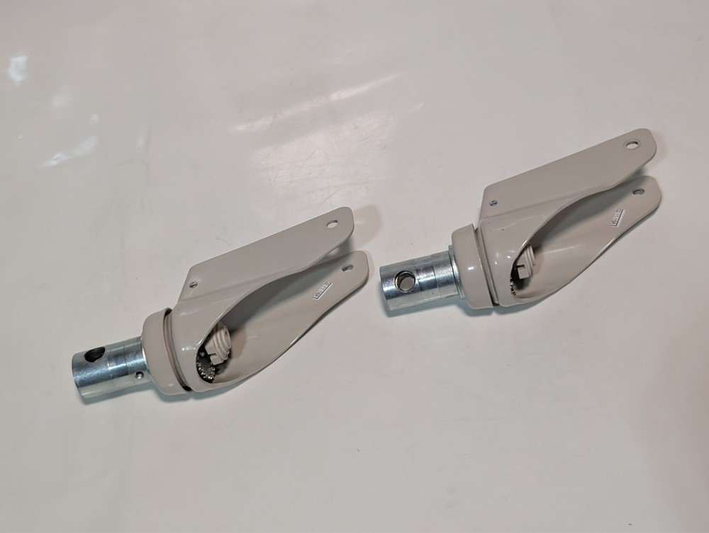 Lot of 2 Unbranded 1.25in post wheel caster brackets cream as shown for 7 in dia