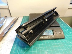 Adjustable Heavy-Duty Three Hole Manual Paper Punch with punch out catcher