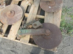 4 JOHN DEERE PLOW COULTERS WITH BRACKETS