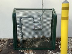 Wall-Mounted Backflow Security Cage – Backflow Enclosure (Green) – Sandbaggy