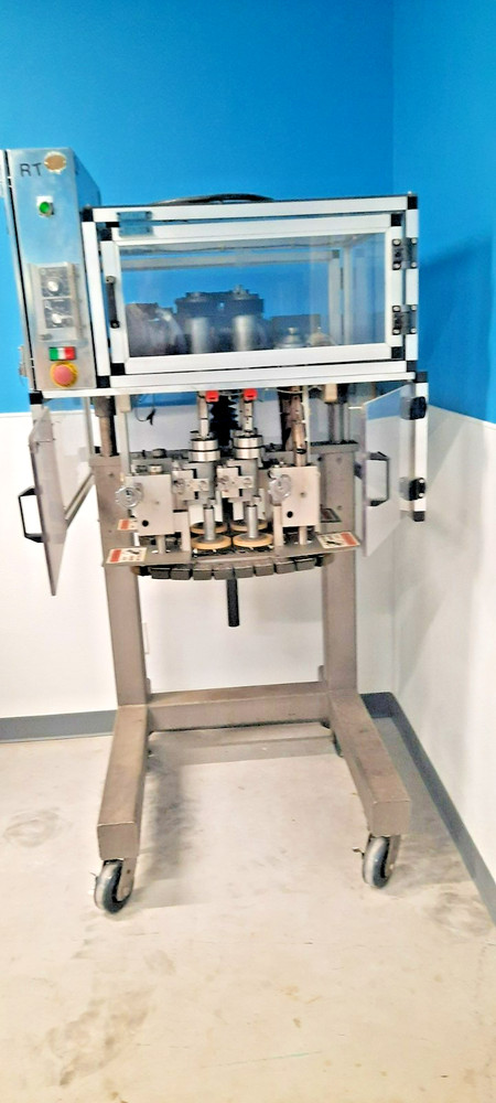 Hardly Used Great condition Resina Model NRT-20 Automatic Cap Retorquer.