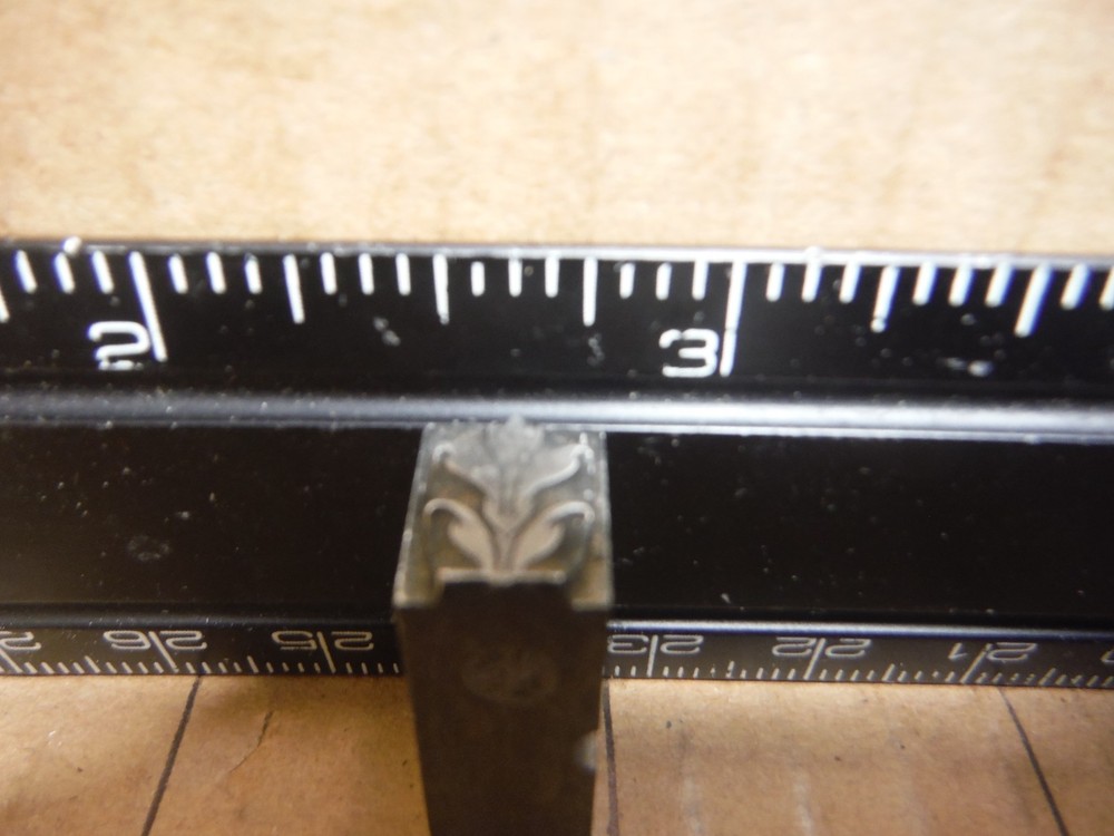 Vintage letterpress printing block