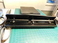 Adjustable Heavy-Duty Three Hole Manual Paper Punch with punch out catcher