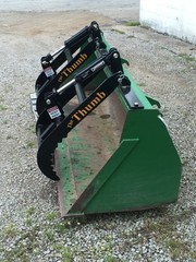 Thumb Grapple. Universal add on grapple attachment for tractors and skid steers