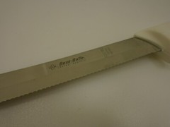 Dexter USA S142-9SC 9 in White Scalloped Serrated Utility Slicer Clip Point XLNT