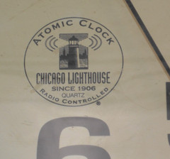 The Chicago Lighthouse 12 1/2″ Atomic Contemporary Analog Black Clock NICE