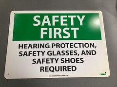 SAFETY FIRST HEARING PROTECTION SAFETY GLASSES AND SAFETY SHOES…10” x 14”