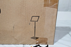 A Sign Adjustable Poster Stand Silver holds 8.5 X 11 inch frame