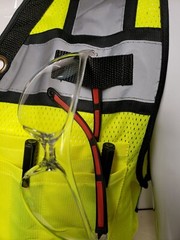 Safety green surveyor vest with tablet pocket.