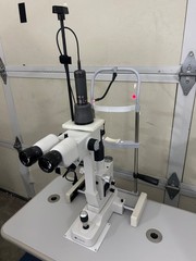 Lumenis Novus Varia Tricolor Ophthalmic Laser paired with SL950LM Slit Lamp 1000
