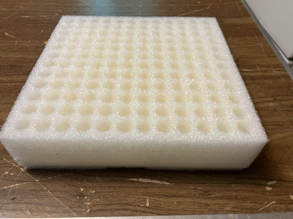11.75” X 11.75” X 2” closed-cell polyethylene packaging foam.
