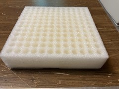 11.75” X 11.75” X 2” closed-cell polyethylene packaging foam.