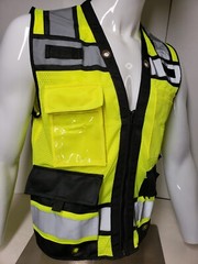 Safety green surveyor vest with tablet pocket.
