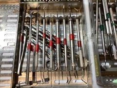 2 – DENTAL STERILIZATION CASSETTES WITH INSTRUMENTS USED