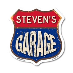 Steven’s Garage Shield Shaped Sign Weather Resistant Crafted in the USA
