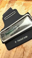 Radiacode 101 Gamma Radiation Detector Portable Dosimeter with green arm band.
