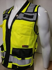 Safety green surveyor vest with tablet pocket.