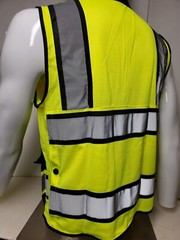 Safety green surveyor vest with tablet pocket.
