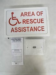 NEW IN BOX EXTRONIX 702-WB-WH-SS1 STEEL EXIT WITH BATTERY, RED LEDS
