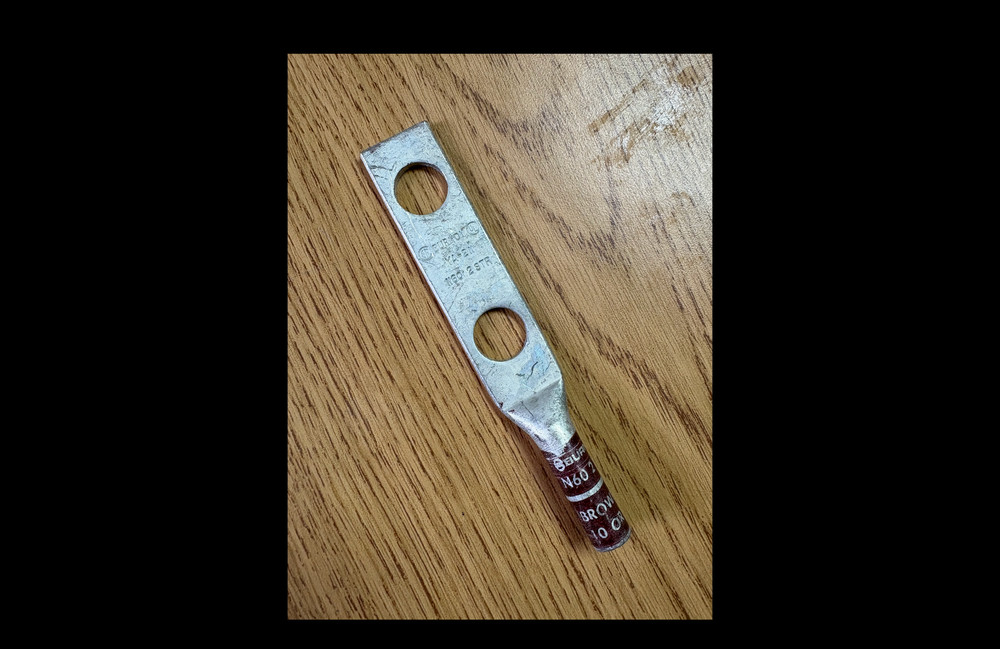 Burndy comp lugs YA2C2N, 2 awg, 2 Hole, 1/2″ stud, Long Barrel. Sold boxes of 25