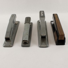 Four Vintage Swingline Staplers Gunmetal Grey (3) & one w/ Woodgrain Pattern