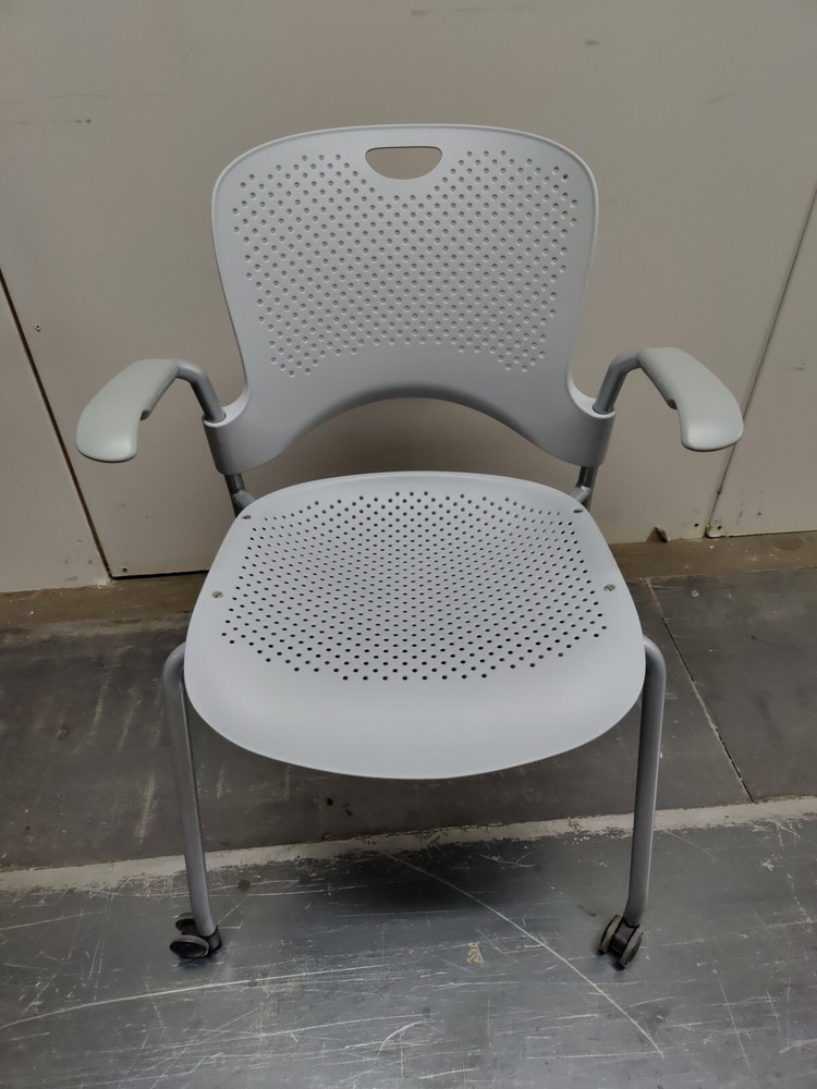 Herman Miller Caper Side Chair W/ Wheels Light Grey Silver seat great condition.