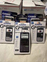 A Lot Of Casio Graphing Calculators 4 Fx9750gIII and 3 Fax CG 50 Calculators