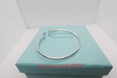Gift.Tilffany & Co Wire bracelet in white gold and diamonds