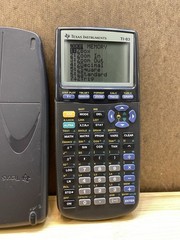1990’s Texas Instruments TI-83 Graphing Calculator & Case W/new batteries